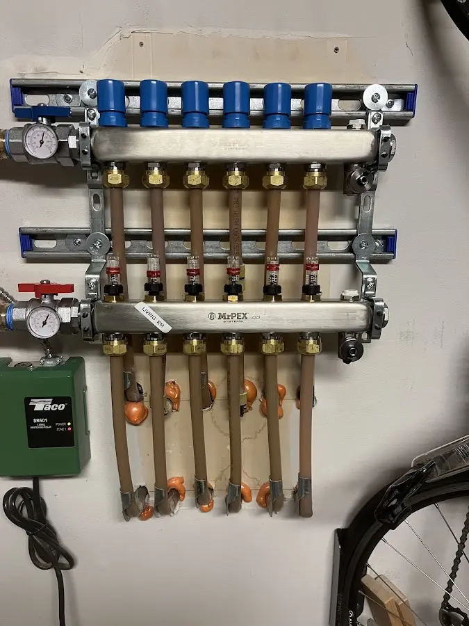 Plumber performing Gas Leak Detection at a residential property in Bondurant